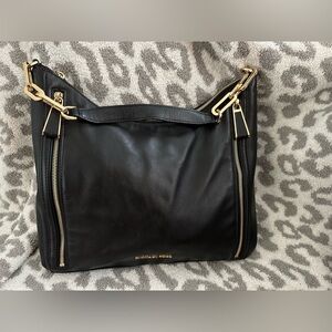 Michael Kor’s black and gold leather tote